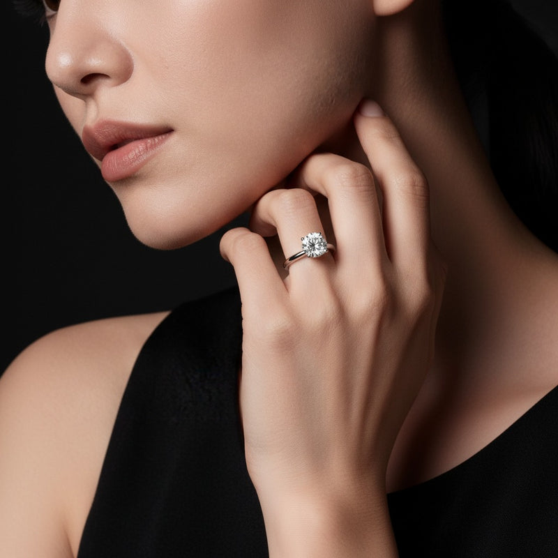 Model wearing round twisted basket cathedral shank solitaire ring