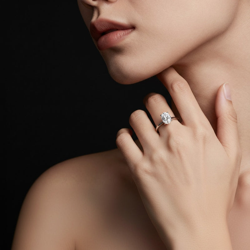 Model wearing oval hidden halo petite shank ring