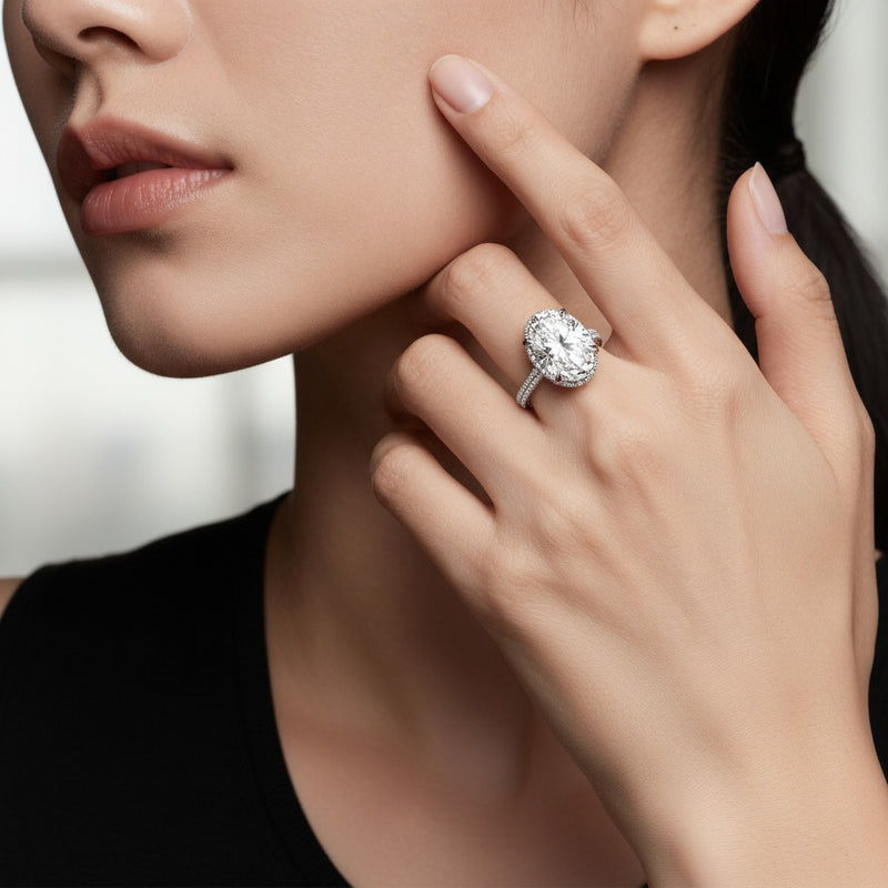 Model wearing oval bold statement accented ring