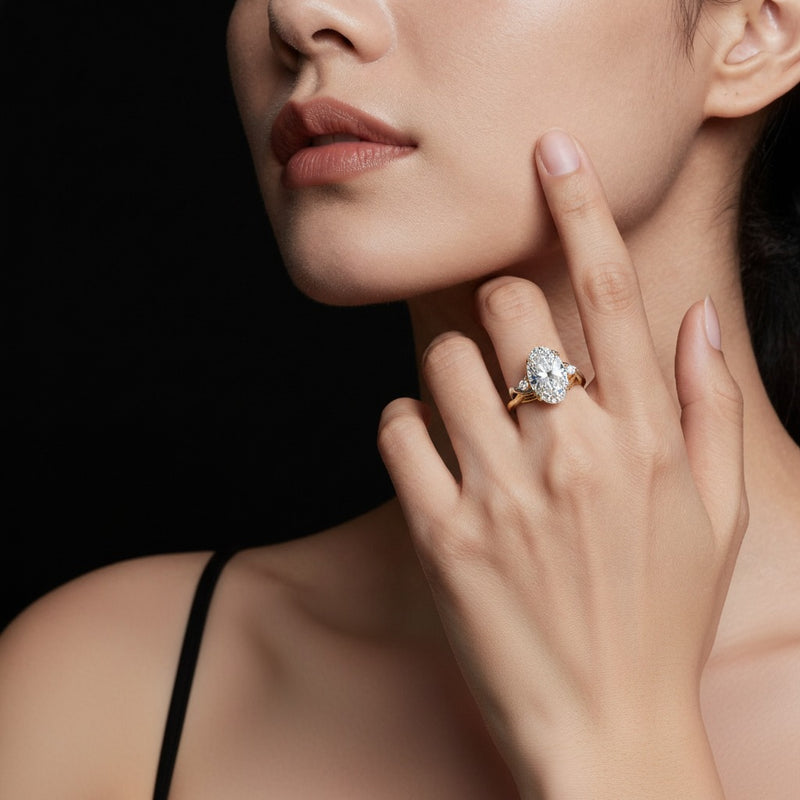 Model wearing oval bold accented engagement ring