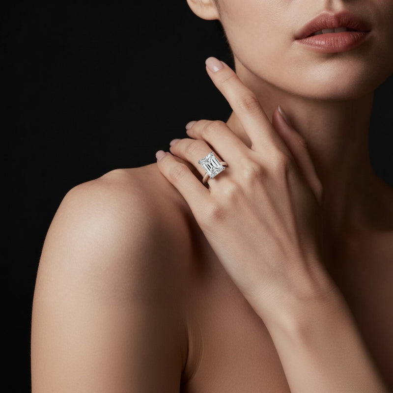 Model wearing radiant knife edge shank solitaire engagement ring