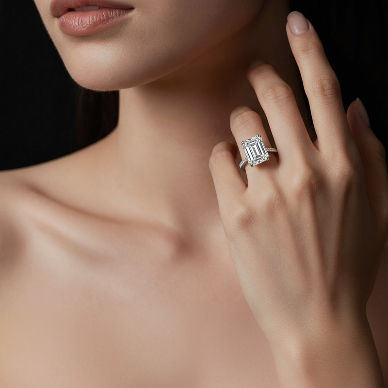 Model wearing emerald bold accented engagement ring