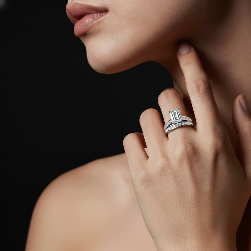 Model wearing emerald channel set bridal engagement ring