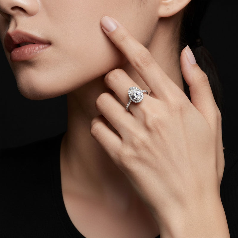 Model wearing pear bold classic engagement ring