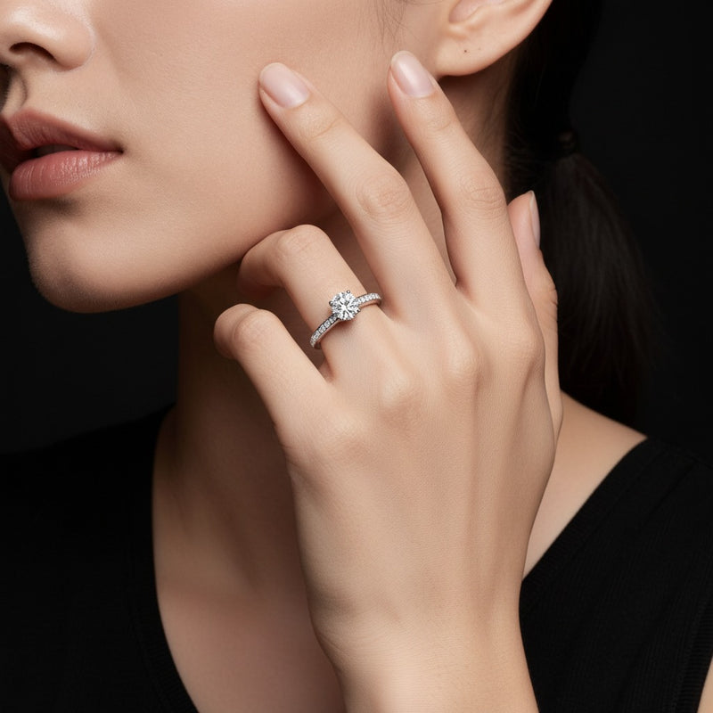 Model wearing round tulip motif accented engagement ring