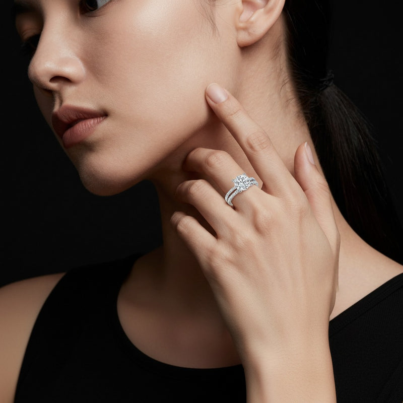Model wearing round three row micro pave engagement ring
