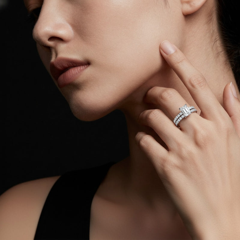 Model wearing radiant classic accented set with band and engagement ring