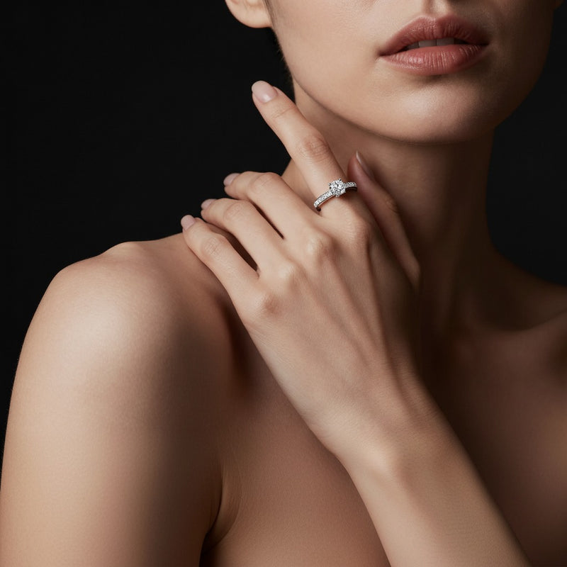 Model wearing round petite shank accented engagement ring