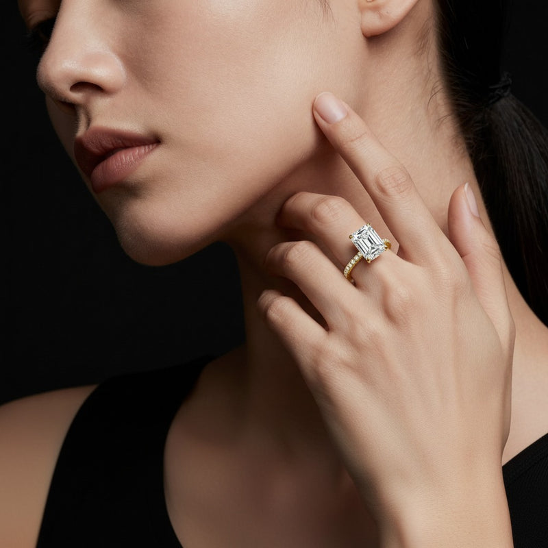 Model wearing cushion classic hidden halo accented solitaire engagement ring