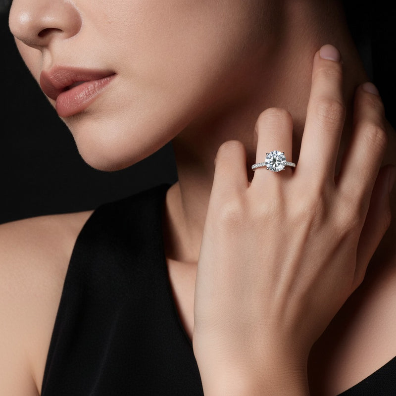Model wearing round hidden halo accented ring