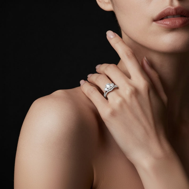Model wearing pear insert jacket ring