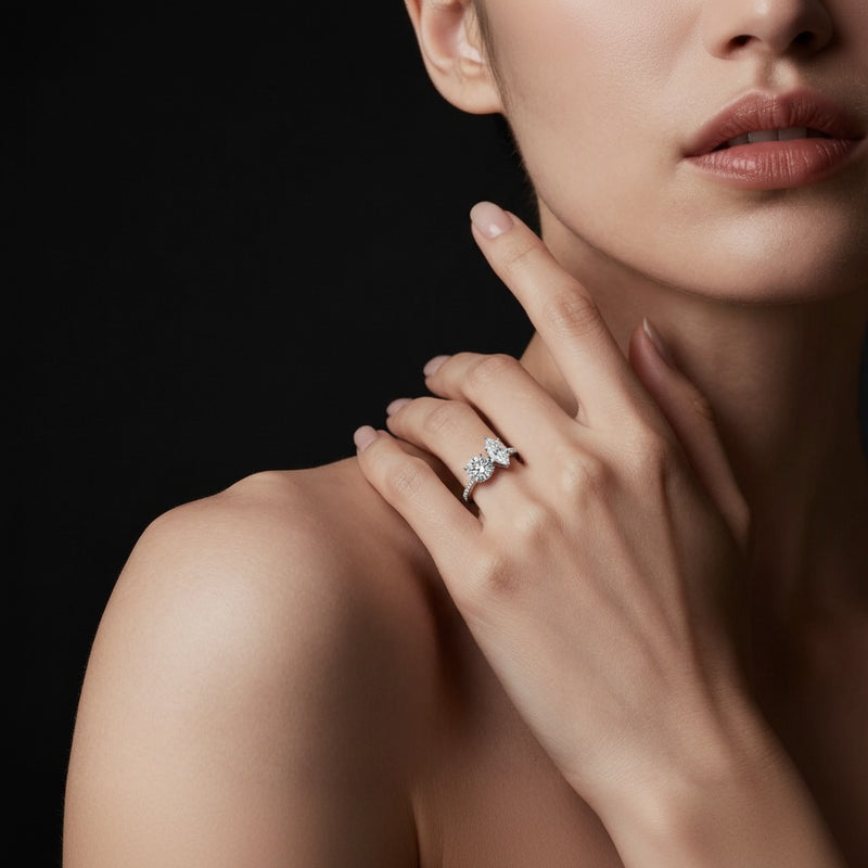 Model wearing round toi et moi engagement ring
