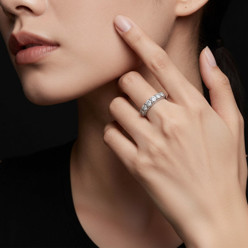 Model wearing round accented double halo set of band and ring