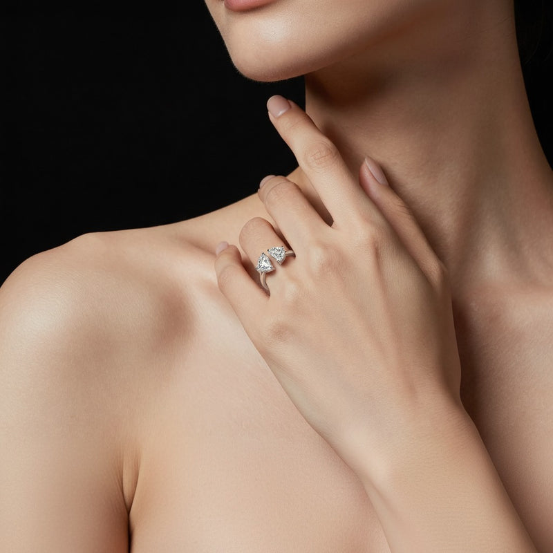 Model wearing pear toi et moi engagement ring