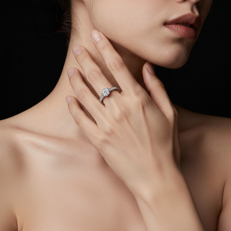 Model wearing oval halo accented fashion ring