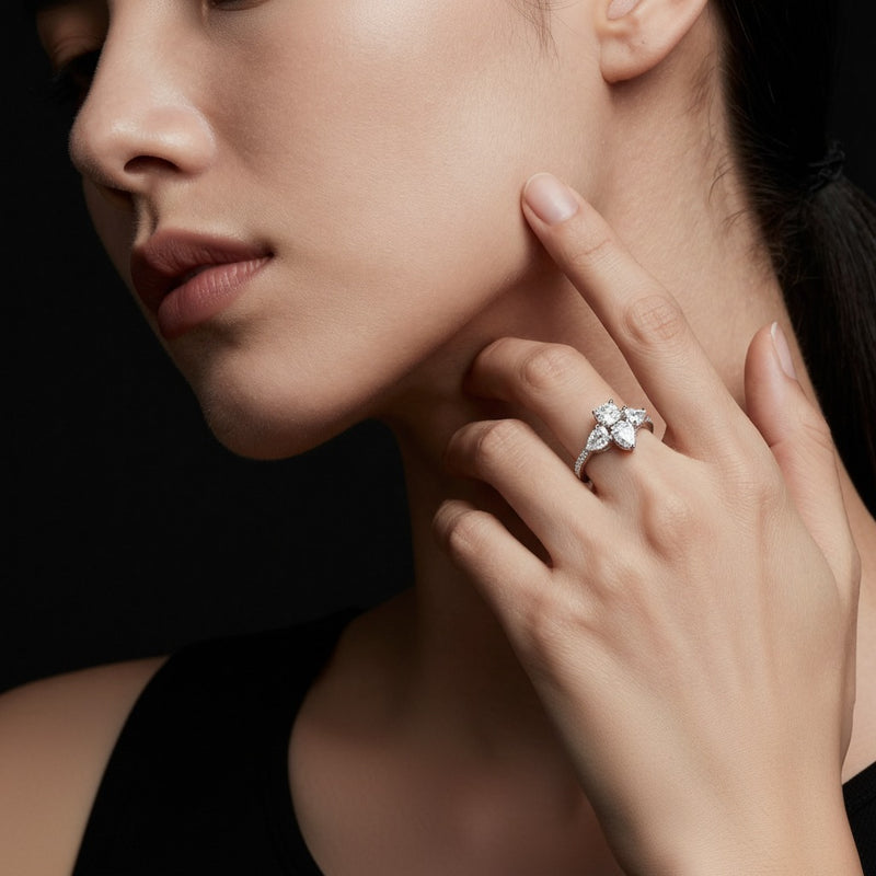 Model wearing oval three stone fashion ring