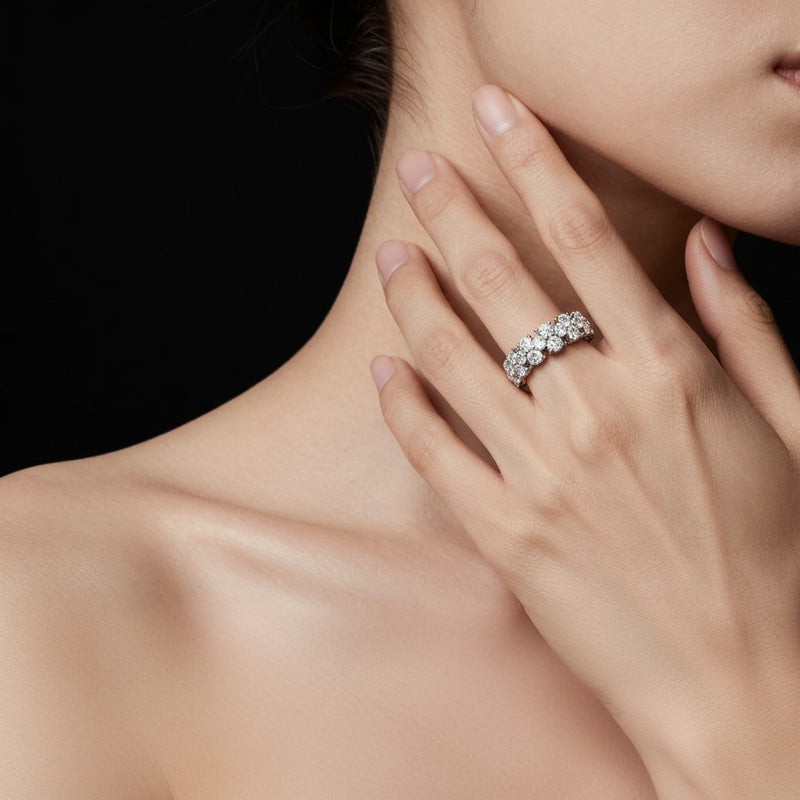 Model wearing round eternity band ring