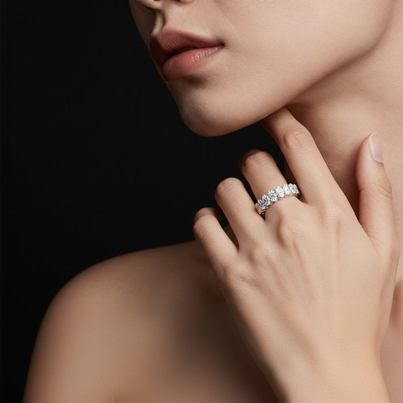Model wearing oval eternity band ring