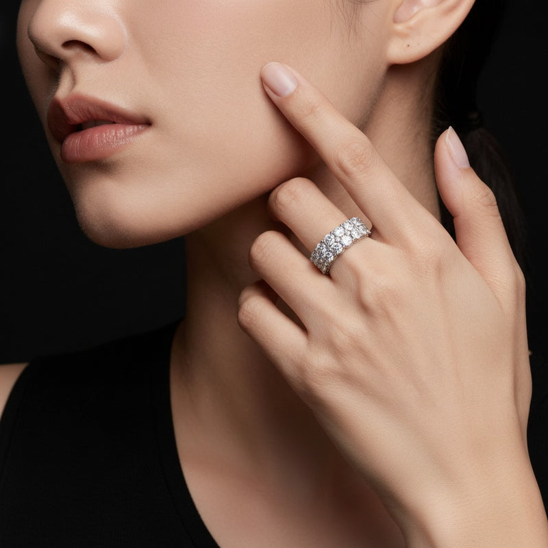 Model wearing round eternity band ring