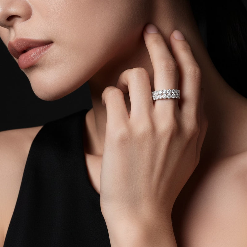 Model wearing pear eternity band ring