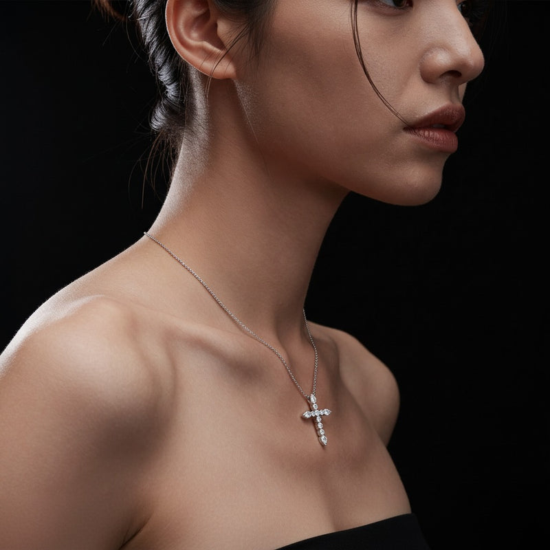 Model wearing pear cross pendant