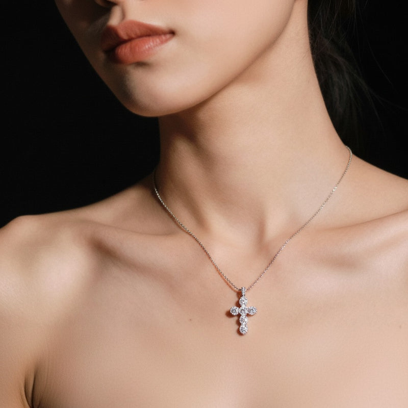 Model wearing oval cross pendant
