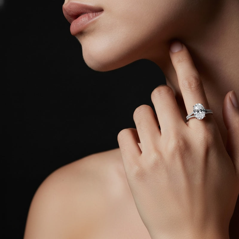 Model wearing oval two row two tone fancy accented engagement ring