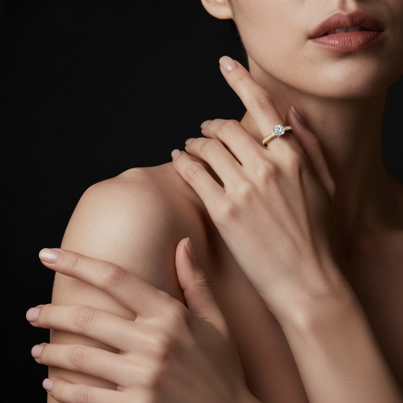 Model wearing round hidden halo two tone engagement ring