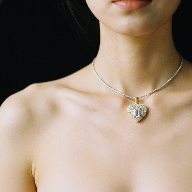 Model wearing heart pendant