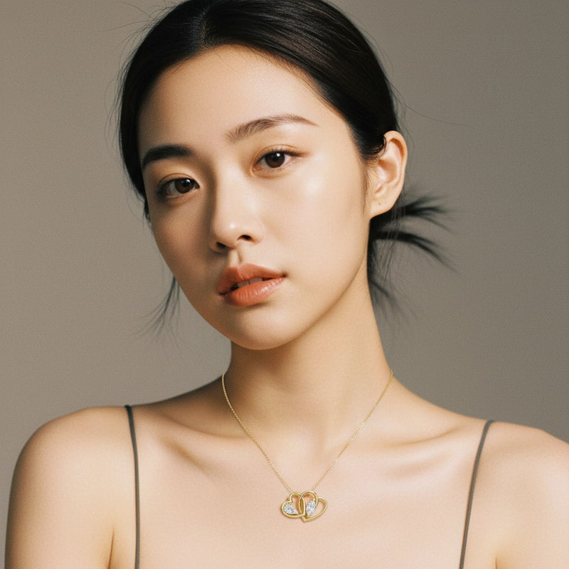 Model wearing heart pendant
