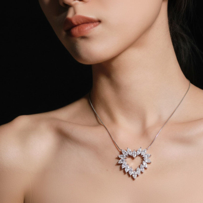 Model wearing heart pendant