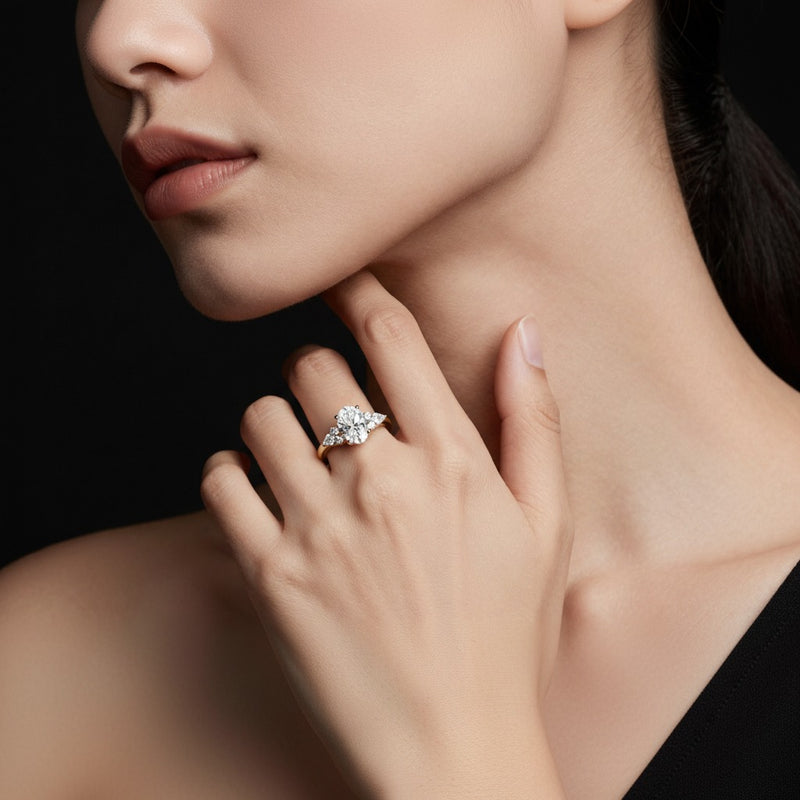Model wearing pear east west fashion ring