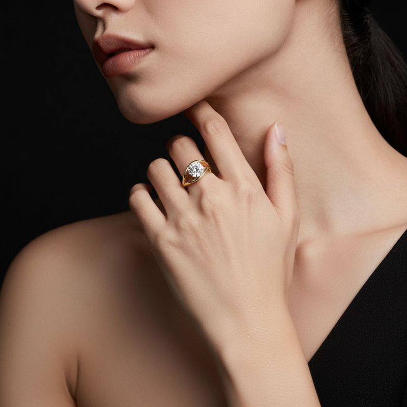 Model wearing round east west solitaire fancy ring