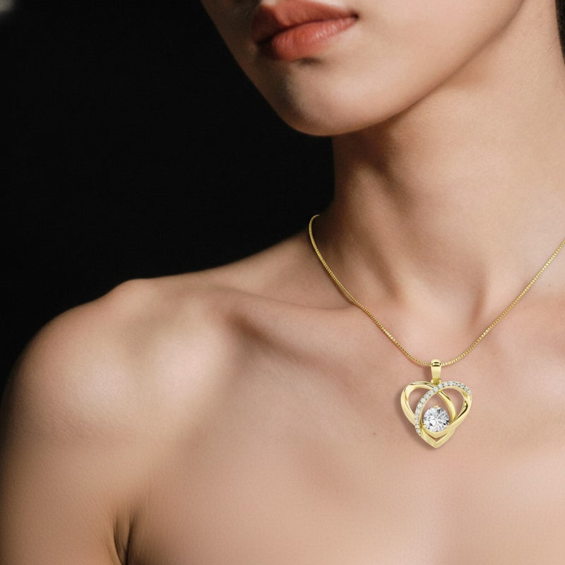 Model wearing heart pendant