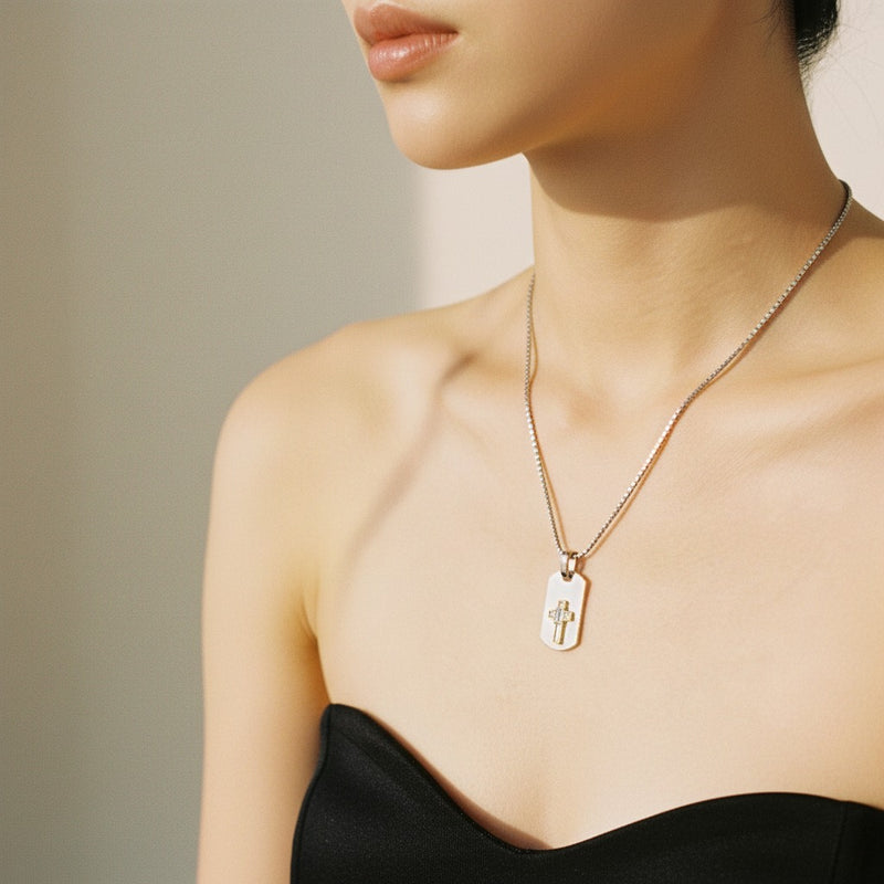 Model wearing emerald dog tag pendant