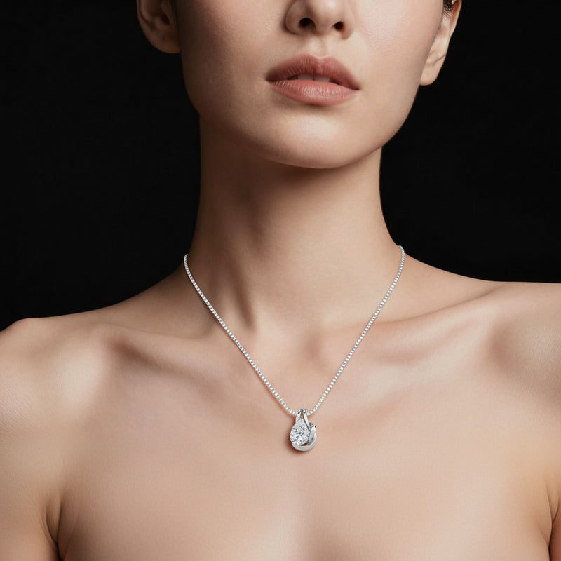 Model wearing pear knot pendant