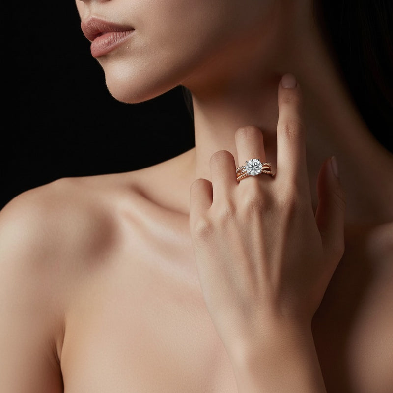 Model wearing round three stone fancy ring
