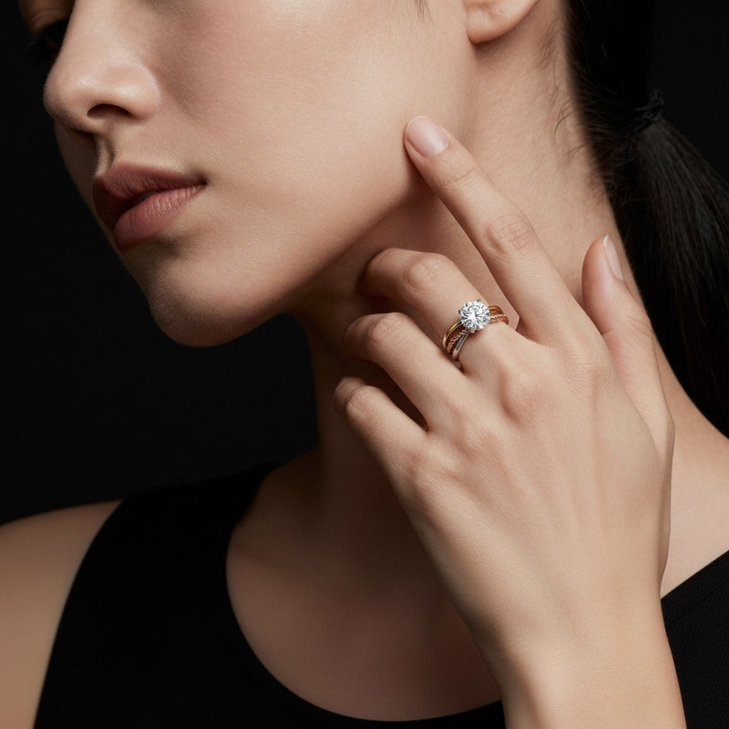 Model wearing round tri color solitaire engagement ring