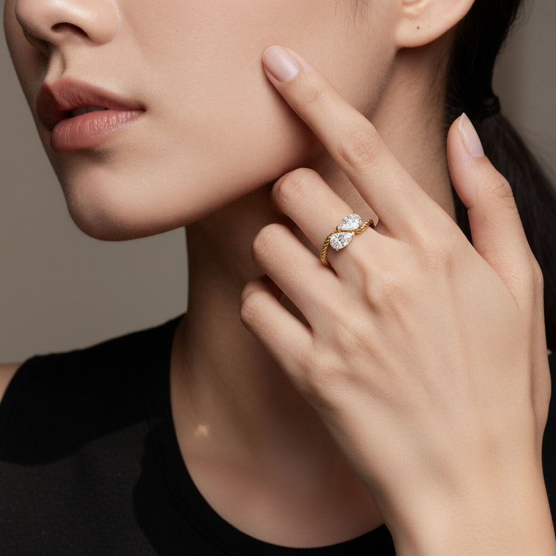 Model wearing pear toi et moi fashiion ring