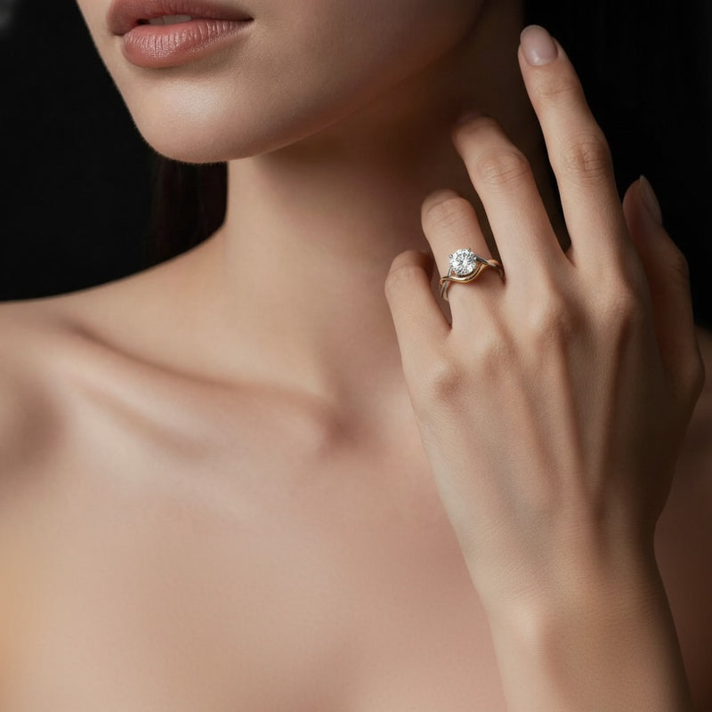 Model wearing round two tone know solitaire engagement ring
