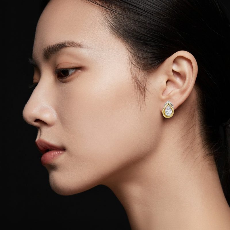 Model wearing pear knot earrings