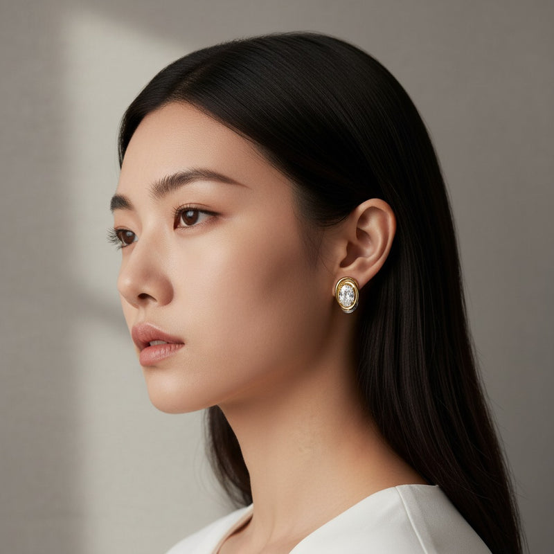 Model wearing oval lab grown diamond f vvs knot earrings