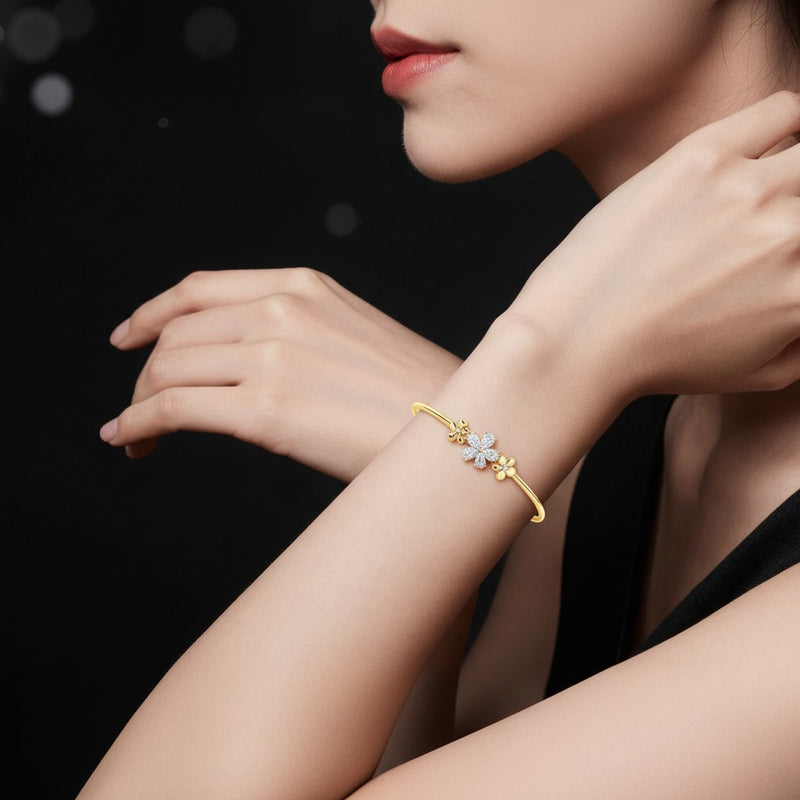 Model wearing pear fancy flower bangle bracelet