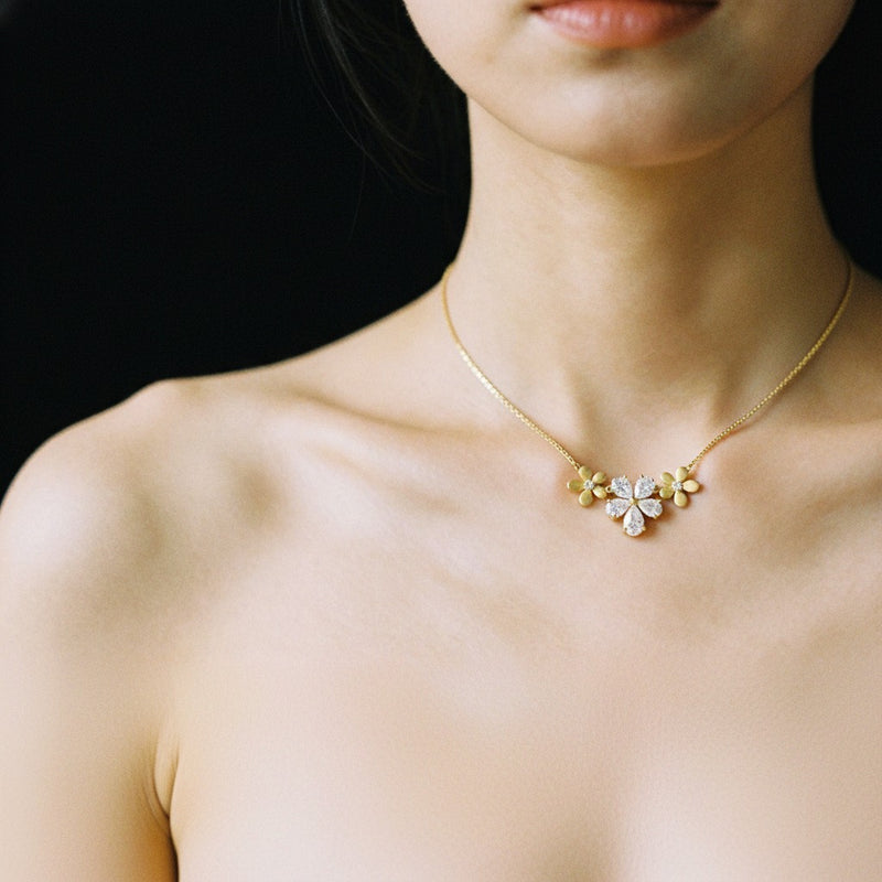 Model wearing pear fancy flower necklace