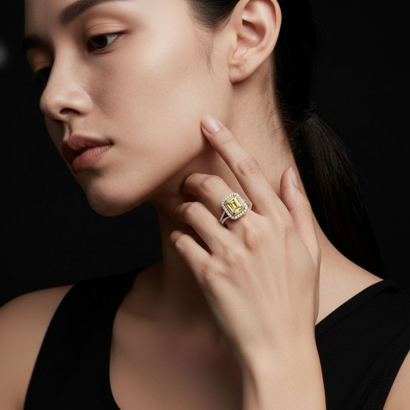 Model wearing radiant split shank halo engagement ring