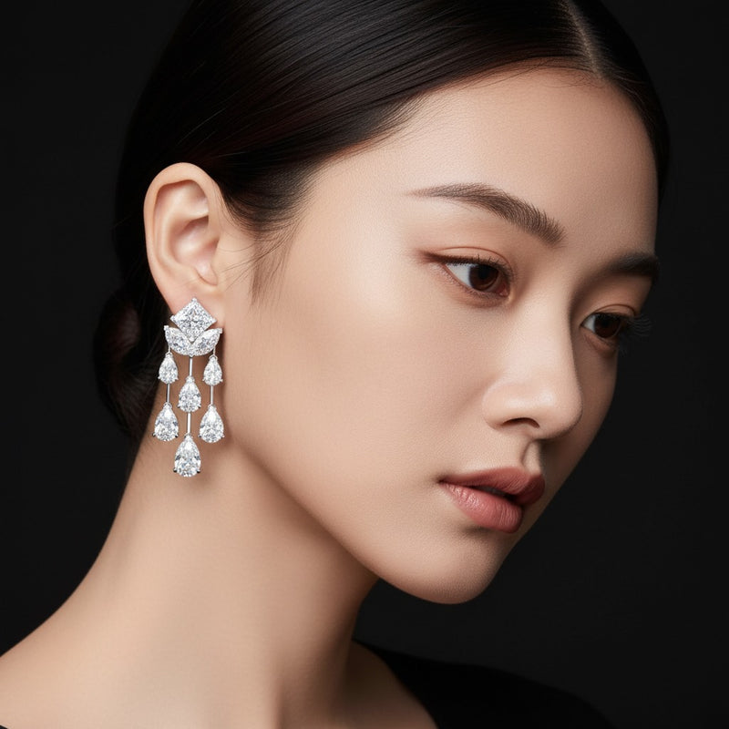 Model wearing princess dangle earrings