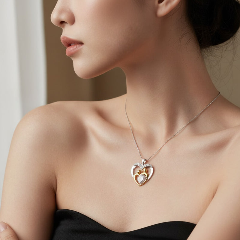 Model wearing heart pendant