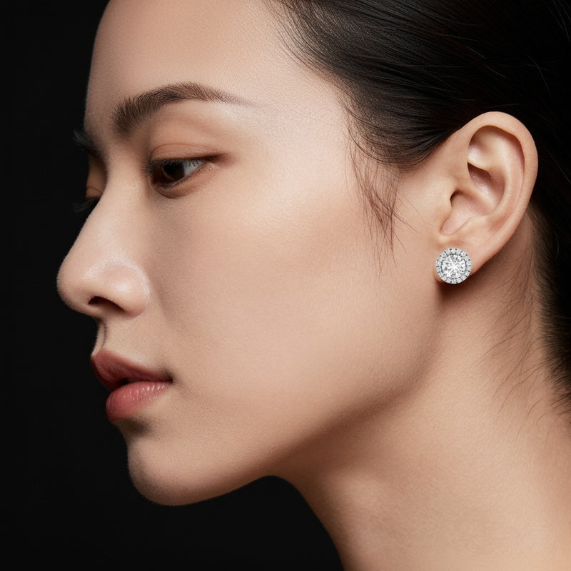 Model wearing round halo stud earrings