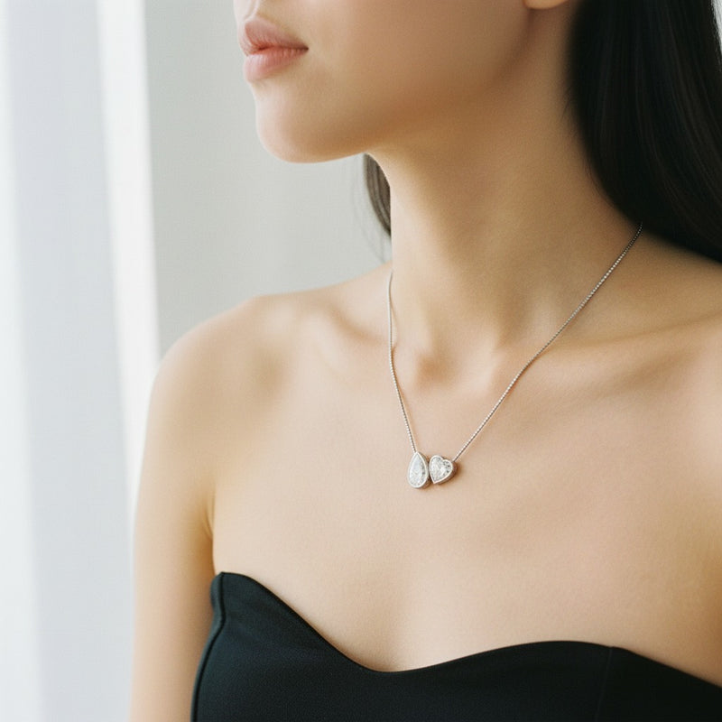 Model wearing heart necklace