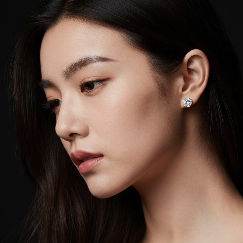 Model wearing round stud earrings